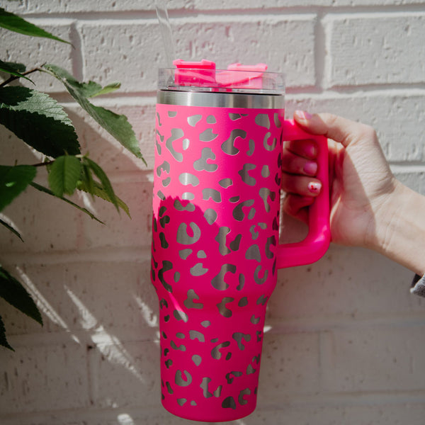 http://katydid.com/cdn/shop/products/tumbler-cup-hot-pink-metallic-leopard-with-handle_grande.jpg?v=1686596152