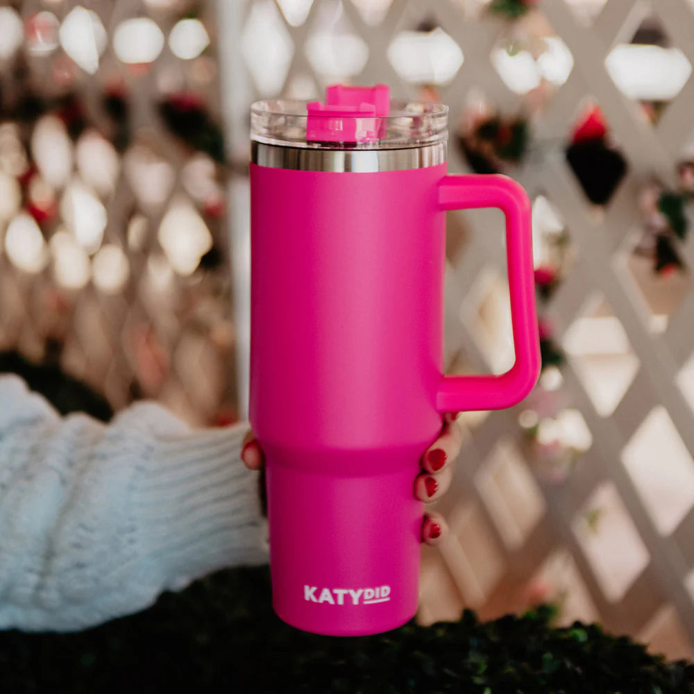 Person holding the best tumbler for cold drinks in pink