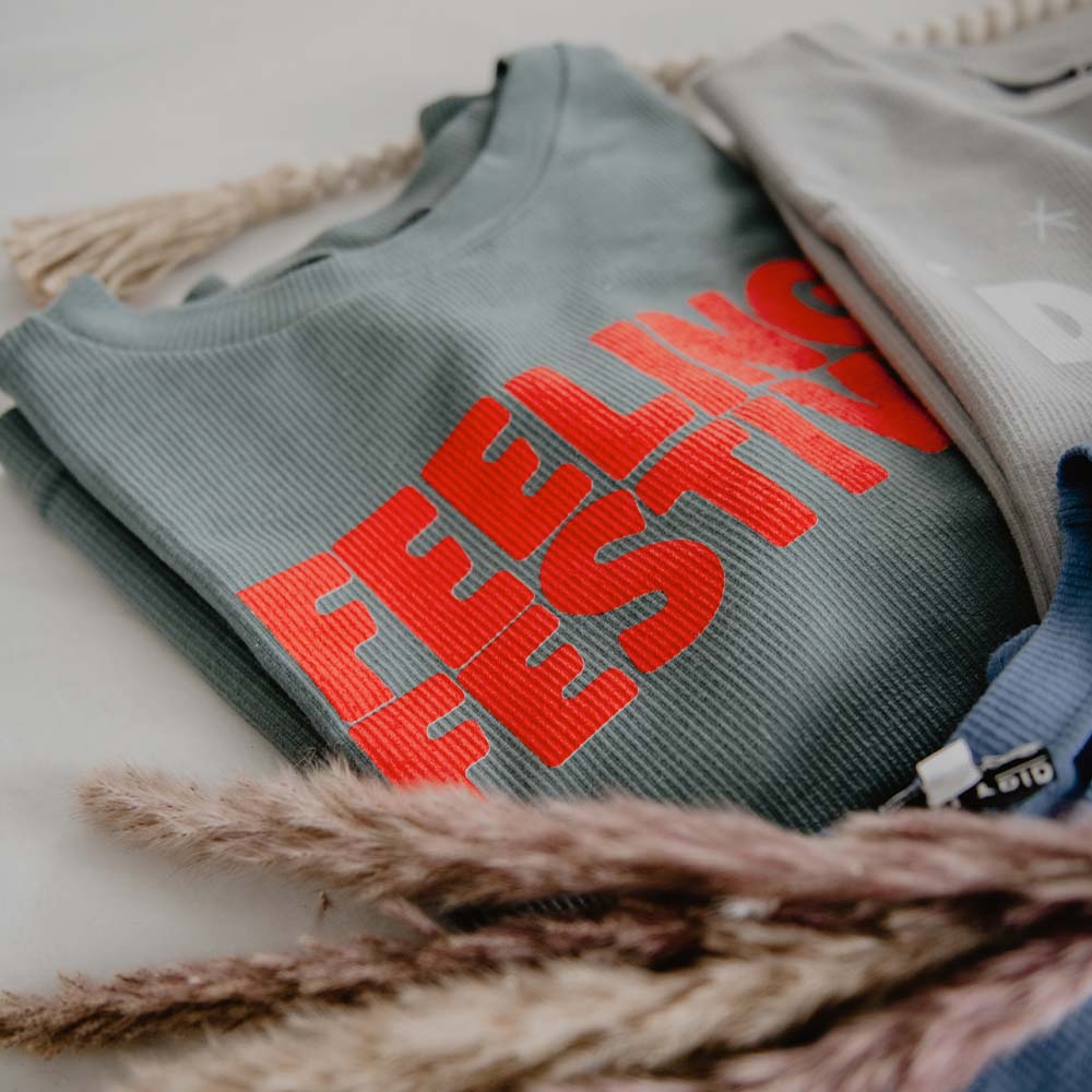 a folded feeling festive sweatshirt