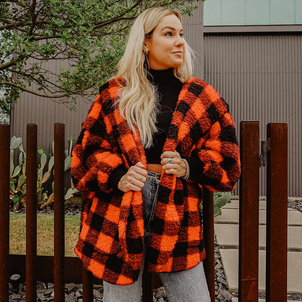 Woman Wearing a Faux for Plaid Coat