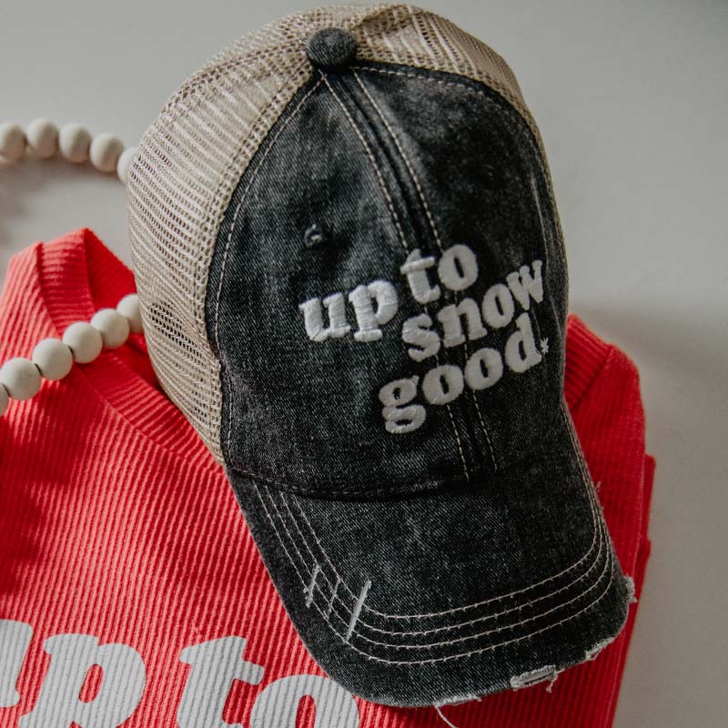 distressed trucker hat embroidered with up to snow good messaging