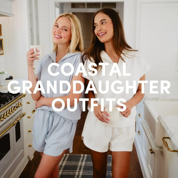 Two women wearing soft neutral matching lounge sets standing in a bright kitchen, smiling and holding coffee, with “Coastal Granddaughter Outfits” text overlay.