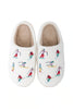 Relax in style with Katydids Apres Ski Winter Slippers—featuring a tan fuzzy sherpa lining and colorful embroidered skiers—perfect cozy après ski footwear.