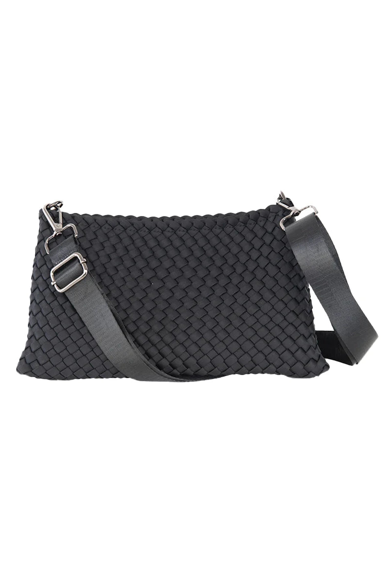 The Katydid Black Woven Everywhere Crossbody Women features a woven texture, adjustable leather strap, and silver hardware—perfect as your everyday bag.