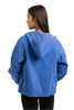 A woman with straight brown hair wears the Katydid Blue Lightweight Hooded Jacket and black leggings, standing with her back to the camera against a white background.