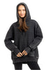 A woman with long brown hair wears the Katydid Charcoal Heart Quilted Pullover Hoodie and black leggings, smiling at the camera against a white background.