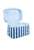 The Katydid Light Blue and Navy Striped Makeup Travel Bag is shown open, displaying its light blue interior with a zippered pocket inside the lid—an ideal quilted cosmetic bag for travel.