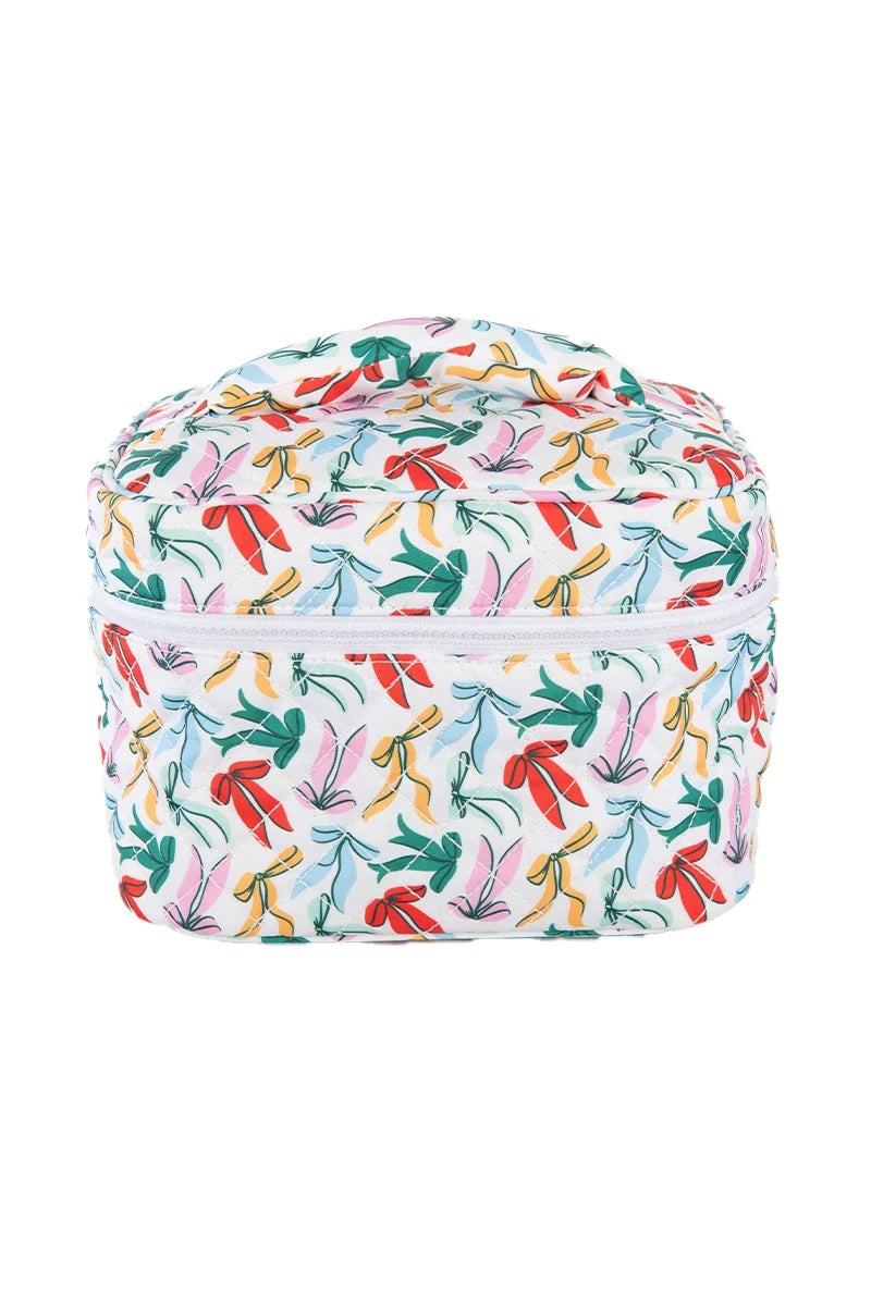 The Katydid Whimsical Bows Cute Makeup Bag is a soft, rectangular girls’ cosmetic bag with a top handle, white background, colorful bow patterns, and a zipper around the top half for easy access.