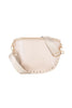 The Katydid Tan Gold-Studded Structured Crossbody features a chic beige style, wide fabric strap, gold hardware, and small gold studs on the curved bottom edge—making it the perfect neutral crossbody bag for fall.