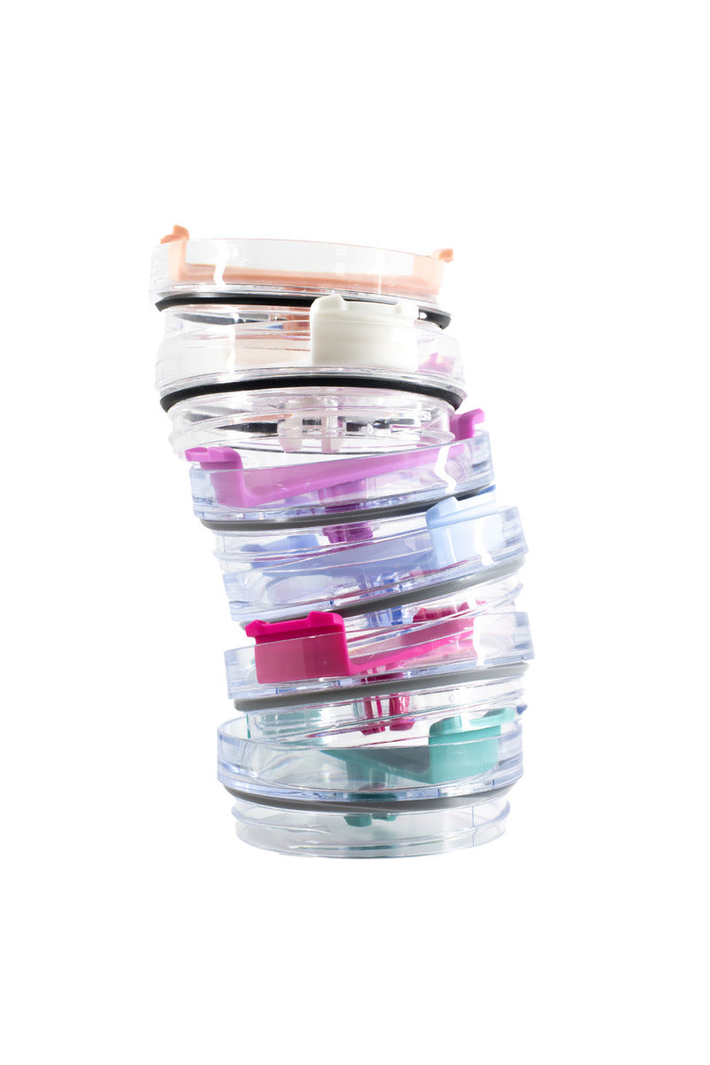 A stack of plastic tumbler replacement lids