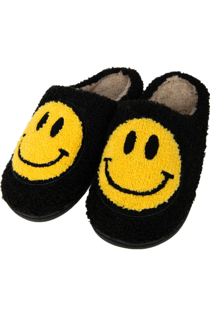 A pair of black smiley face slippers for women