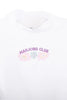 The Katydid Mahjong Club Mockneck Pullover features MAHJONG CLUB in purple above pastel flowers and a green tile—perfect for game night with friends.