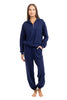 A woman stands barefoot, modeling the Katydid Classic Navy Two-Piece Pants Set with a half-zip pullover and relaxed-fit pants against a plain white background.