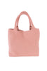 The Katydid Blush Woven Tote Bag is a large, soft-structured handbag with two handles and a textured basket-like pattern, displayed against a white background.
