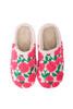 The Katydid Whimsical Roses Fuzzy Slippers for women are cozy, cream-colored sherpa slippers featuring soft texture and embroidered pink and red roses with green leaves.