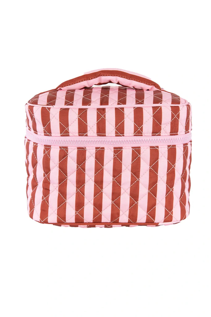 The Katydid Pink and Wine Striped Quilted Makeup Bag features vertical stripes, a top handle, and a front zipper—ideal as your travel makeup pouch.
