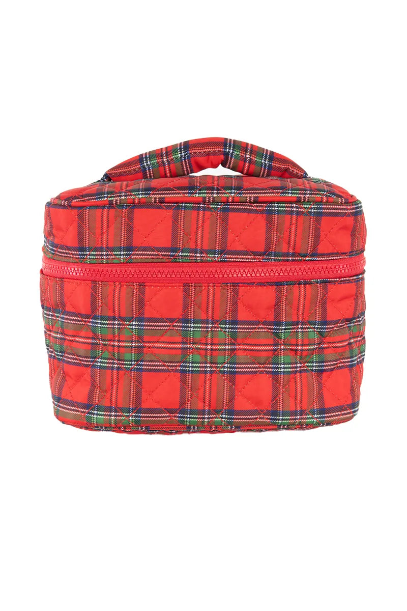 The Katydid Royal Stewart Plaid Holiday Travel Makeup Bag features quilted red and green plaid fabric, a top handle, and a zipper around the middle—perfect for festive makeup storage against a white backdrop.