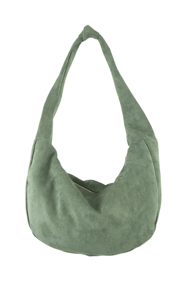 The Katydid Green Suede Tote Bag For Women features a soft sage hue, wide strap, and front zipper closure—ideal for carrying your everyday essentials this fall.