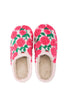 The Katydid Whimsical Roses Fuzzy Slippers for women feature a cream base with bright pink and red embroidered roses plus green leaves, shown from above against a white background.