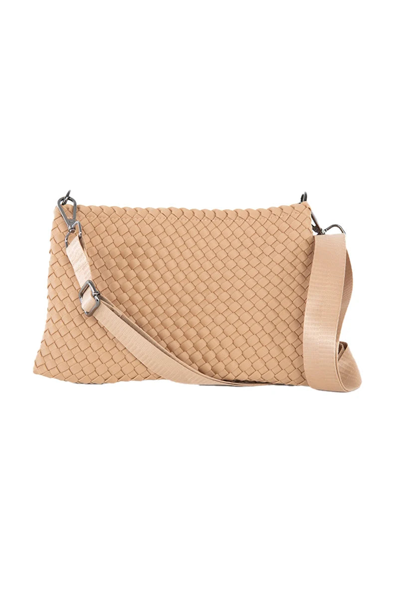 The Katydid Camel Woven Everywhere Crossbody Sling Bag, crafted from waterproof neoprene with a wide matching strap and silver hardware, is shown on a white background—perfect as your everyday accessory.