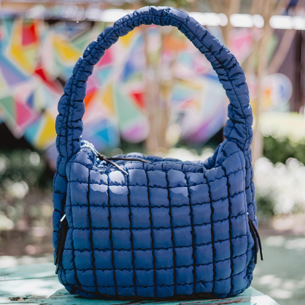 The perfect bag for the perfect day. The Navy Oversized Quilted Hobo Tote Bag is the cute oversized quilted puffer tote you need to wear.