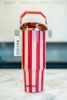 The Moms Faves Gift Box by Katydid.com features a tall tumbler with pink and red stripes, a pink handle, an amber lid, and a KATYDID tag, displayed on a marble countertop against a blurred kitchen background.