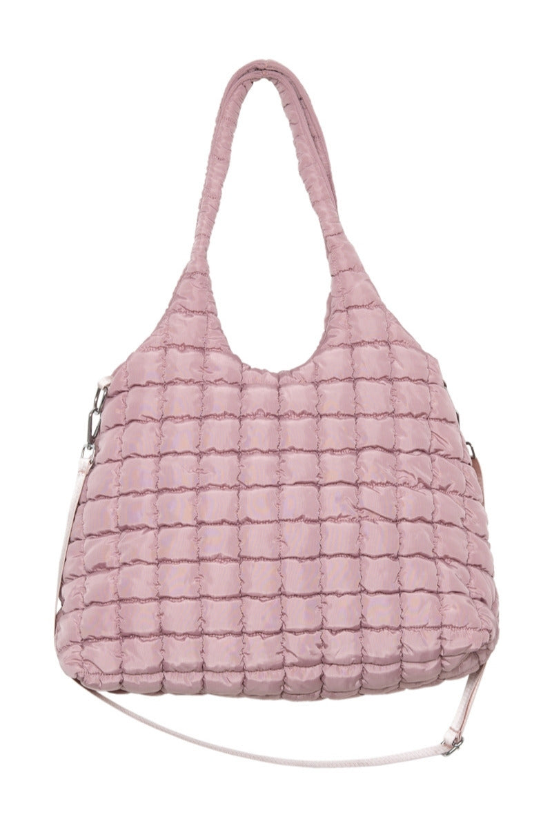 The Katydid Mauve Rectangular Quilted Puffer Bag is a roomy, soft tote with a grid-stitched design, short handle, and detachable long strap.