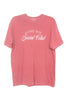 The Katydid Game Day Social Club Graphic Tee is a faded red Comfort Colors women’s t-shirt with GAME DAY Social Club in white print on the front, laid flat on a white background—ideal for casual, everyday wear.