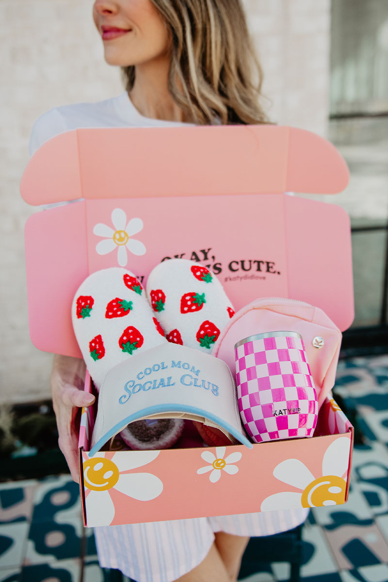 women's gift box for her with drawvberry slippers, pink sling bag, wine tumbler, and cool mom social clab hat,