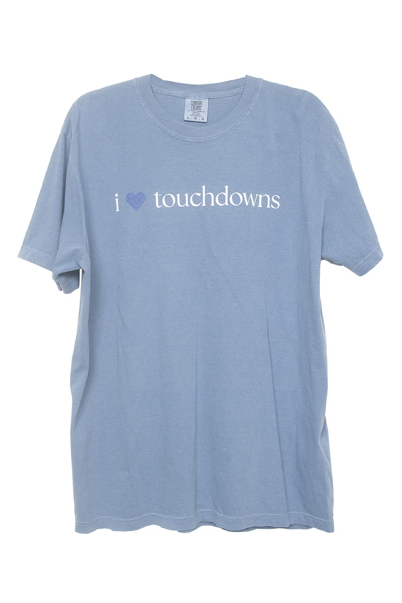 The Katydid I Heart Touchdowns Womens Graphic Tee features white I Heart Touchdowns text on light blue—your must-have shirt for game day.