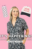 A woman in black-and-white bow pajamas stands before a pink background. Floating nearby are a can cooler and cap. Text below: ITS HAPPENING | Bridesmaid Proposal Box by Katydid.com—perfect bridesmaid gift set, was 128, now 85.