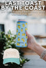 A hand holds a blue can cooler with lemons and Katydid.com branding. Above, text promotes the 49 “Last Toast by the Coast” Bridesmaid Proposal Box—ideal for coastal bachelorette gifts. A “Tanned  Tipsy” hat rests in the lower left corner.