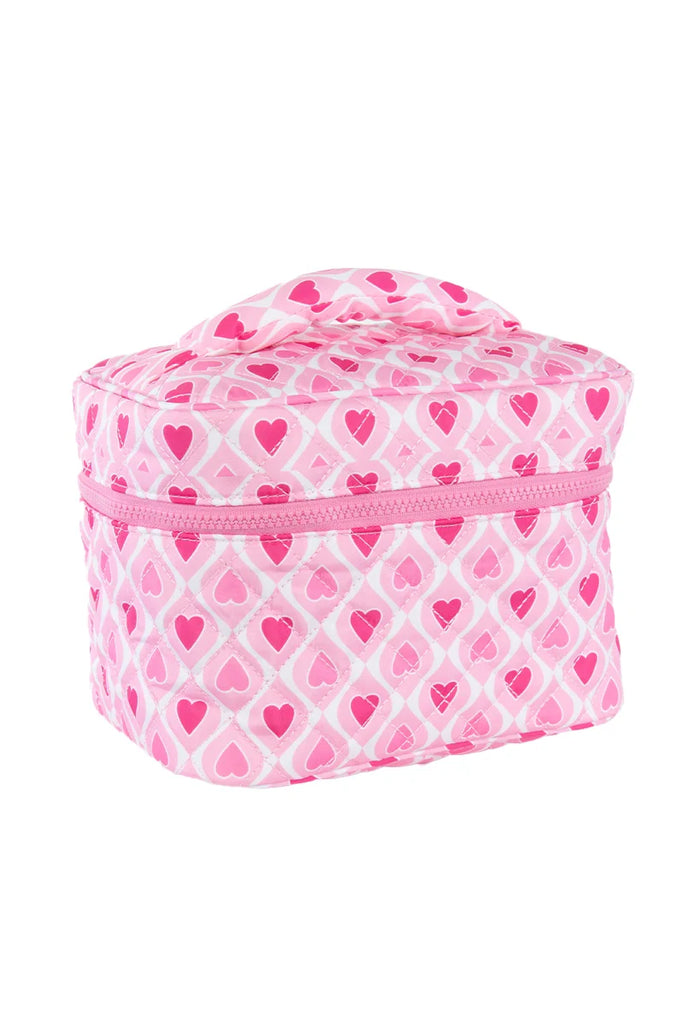 The Katydid Light and Hot Pink Hearts Cosmetic Bag features a handle, zippered middle closure, and a pink heart and diamond pattern on a white background.