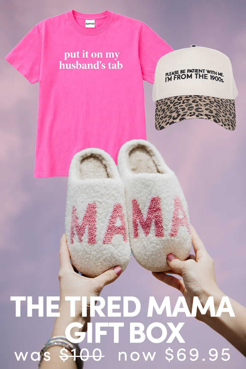 The Tired Mama Gift Box by Katydid.com features a pink “put it on my husband’s tab” tee, leopard-print “PLEASE BE PATIENT WITH ME. I’M FROM THE 1900s.” hat, and fuzzy “MAMA” slippers—was 100, now 69.95.