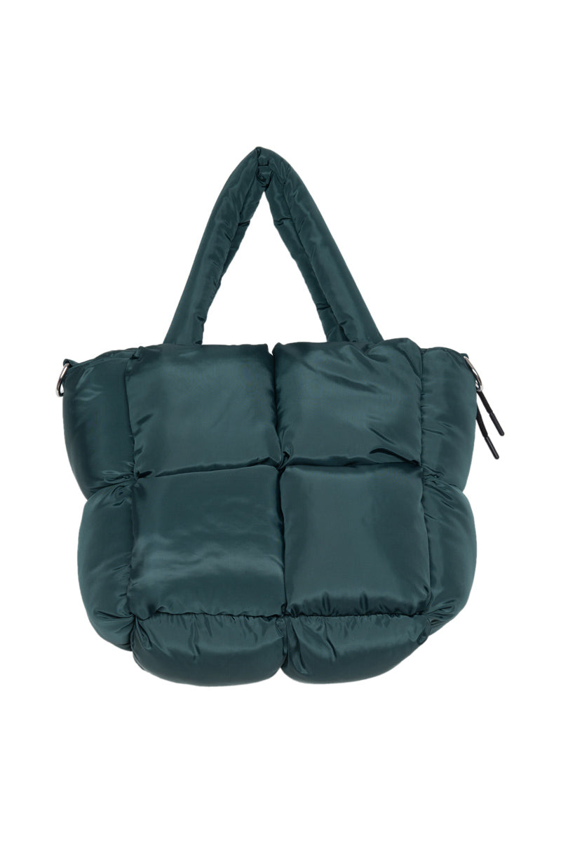 This dark green padded tote bag from Katydid.com features a quilted square design, two short handles, and a shiny, puffy material that gives it a soft, cushioned look with sections divided by visible seams. Ideal for storing your cozy slippers or other cute essentials as part of the Build Your Own Katydid Set—10 items for 60 a 350 value.