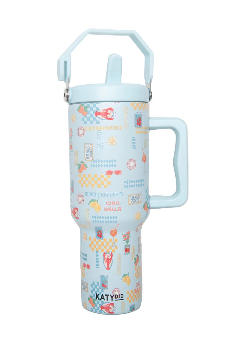 The Katydid Italian Summer Stainless Steel Tumbler features a handle, straw lid, playful CIAO BELLA graphics, and combines style with function for on-the-go use.