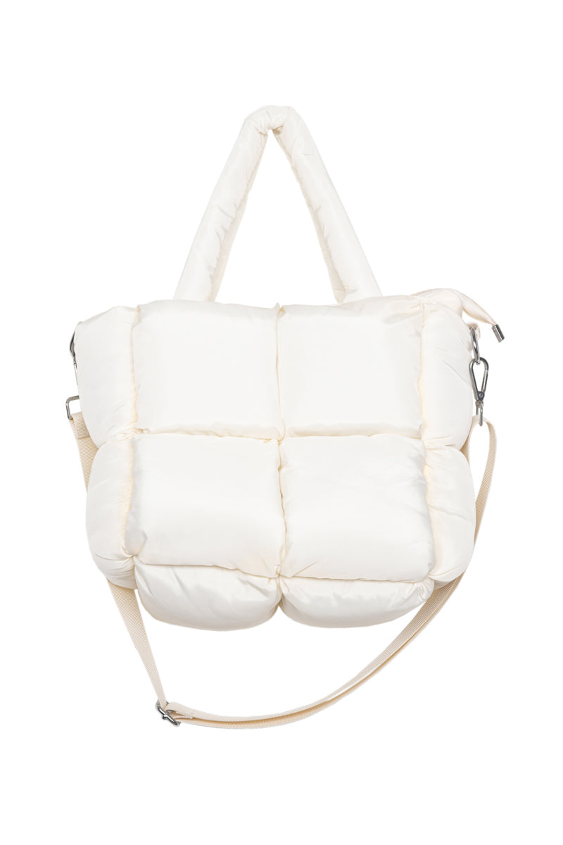 A white, quilted puffer tote bag from Katydid.com, featuring padded handles and an adjustable shoulder strap, is displayed against a plain white background—the ideal accessory to complement your cute collection or to include in your Build Your Own Katydid Set 10 items for 60, a 350 value.