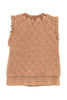 The Katydid Brown Garment Washed Quilted Ruffle Sleeve Vest is lightweight with ruffled armholes and ribbed elastic trim at the collar and hem, shown from the back for a cozy fall look.