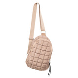 Adding to the quilted bag love! The sling bags with quilted fabric are going to be a hit. Add the Tan Quilted Sling Bag to your cart!