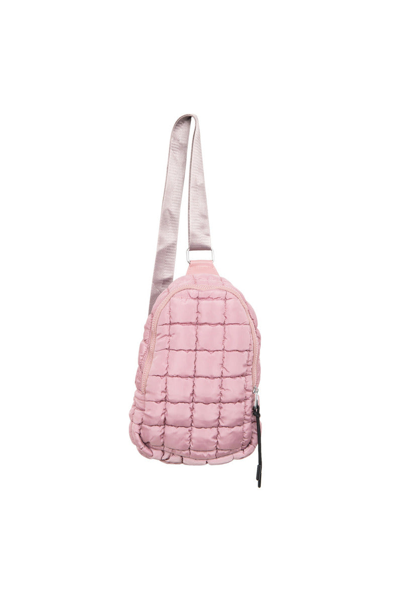 The Katydid Mauve Crossbody Quilted Sling Bag features a single wide strap and zipper closure, ideal for a girly aesthetic, and is shown against a plain white background.
