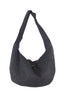 The Katydid Black Spacious Suede Tote Bag is a relaxed hobo shoulder bag for women, featuring a single wide strap and a slouchy shape—perfect as your go-to fall tote.