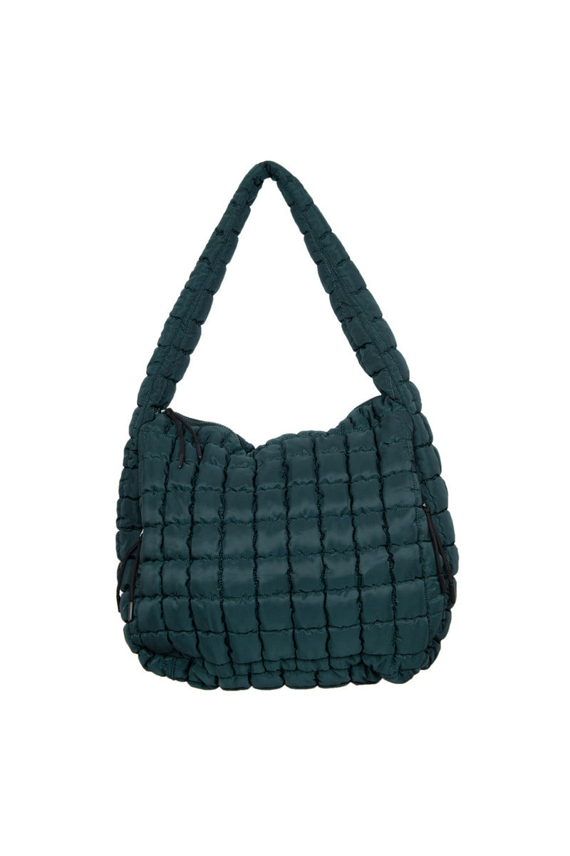 The Katydid Forest Green Quilted Puffer Tote Bag features a thick, woven texture and single padded strap. This fall-inspired shoulder bag is shown on a white background.