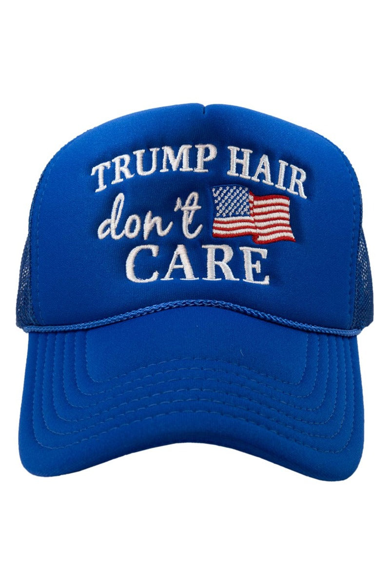 Show your patriotic spirit with the Katydid Trump Hair Dont Care Foam Trucker Hat—this blue trucker features white embroidered text and a small American flag patch. Wear it proudly.