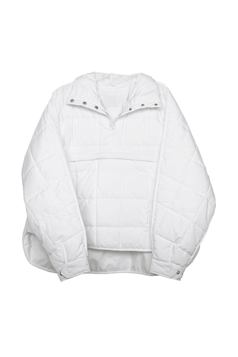 The Katydid White Puffer Pullover Jacket features long sleeves, a high snap-button collar, front kangaroo pocket, loose fit, and a slightly curved hem for stylish comfort.