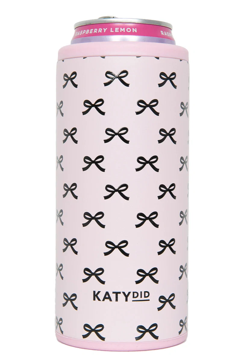 The Black  Pink Mini Bows Tall Can Cooler by Katydid features a light pink slim design with small black bows and KATYDID printed on it, plus a metallic pink top rim labeled RASPBERRY LEMON—perfect for your favorite drinks.